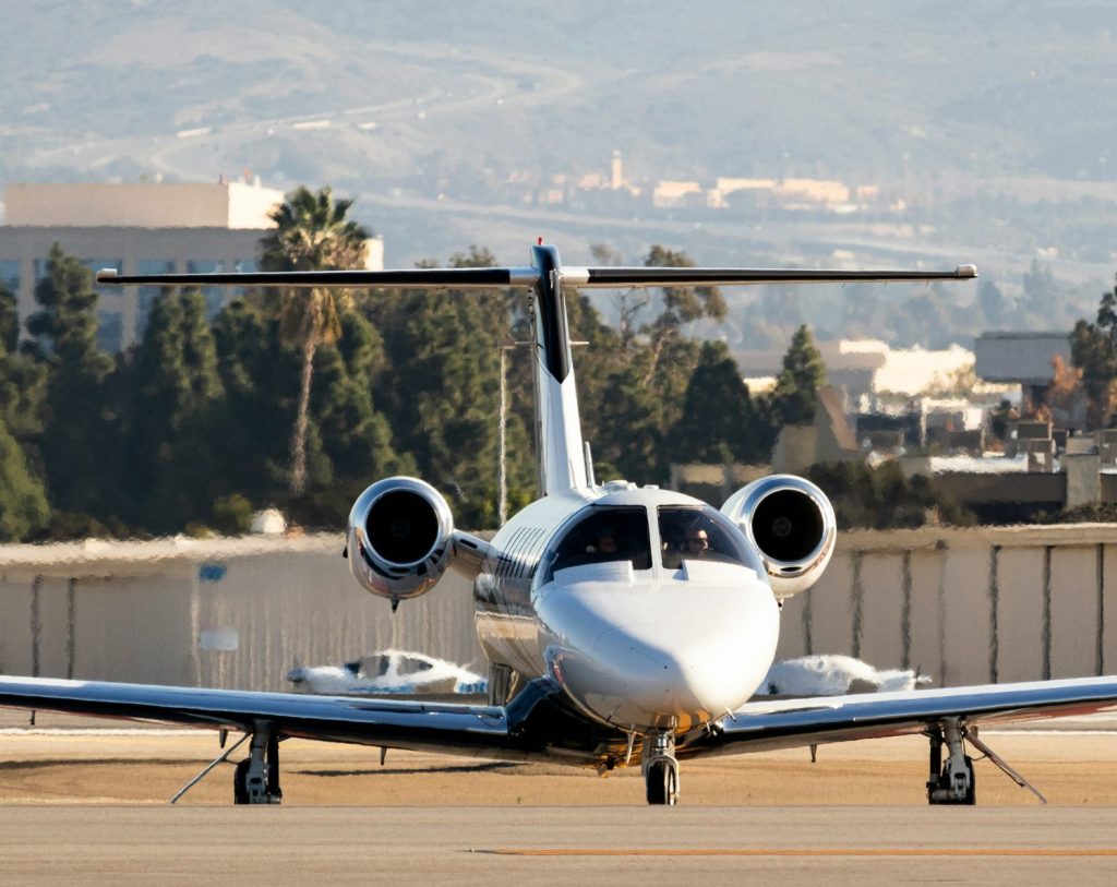 Business jet taxiing at the airport