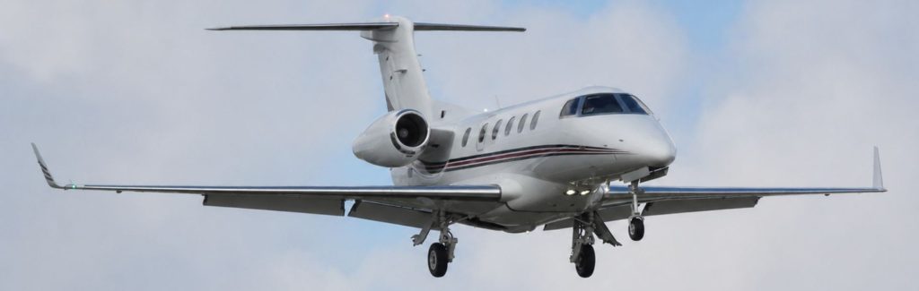 Phenom 300 in flight
